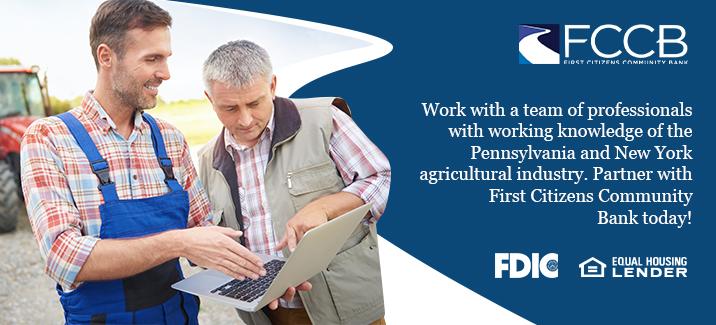 farmers looking at computer